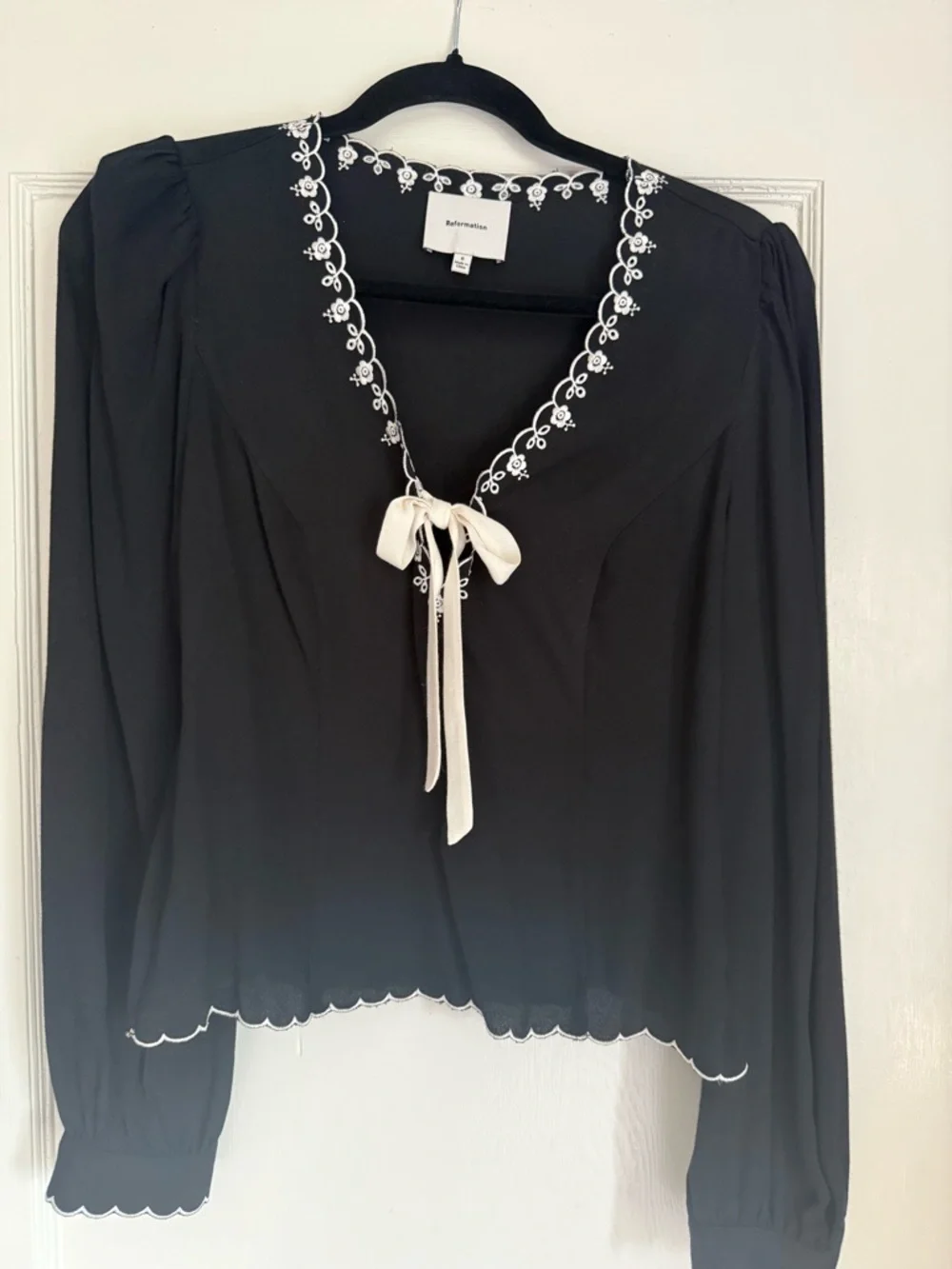 Reformation Black V-Neck Tie-Front Blouse with Cream Bow